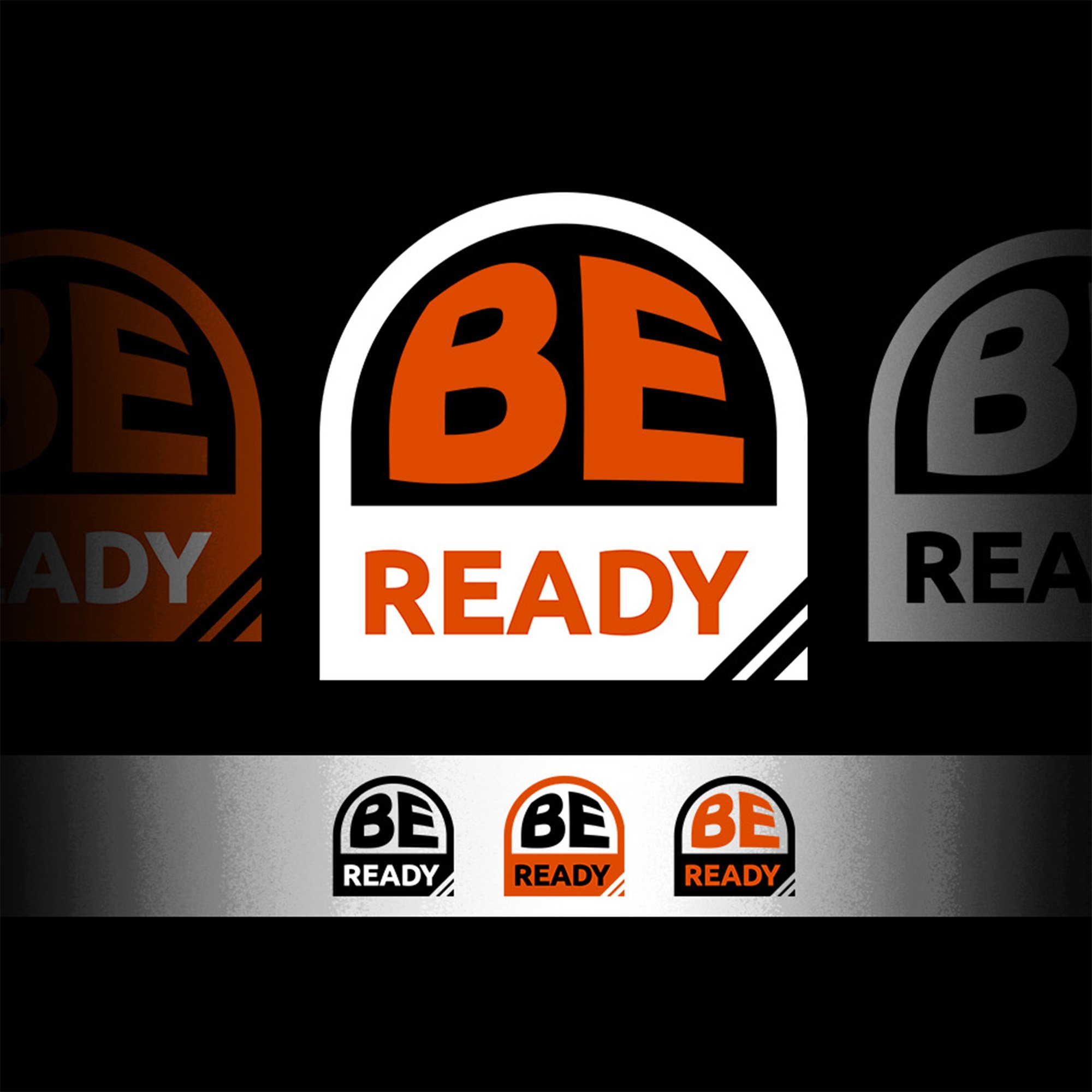 Graphic design featuring the phrase 'BE READY' with the words inside a semi-circle shape in bold letters. The central logo is in orange and white with black text, and there are two smaller variations displayed below on a gray background.