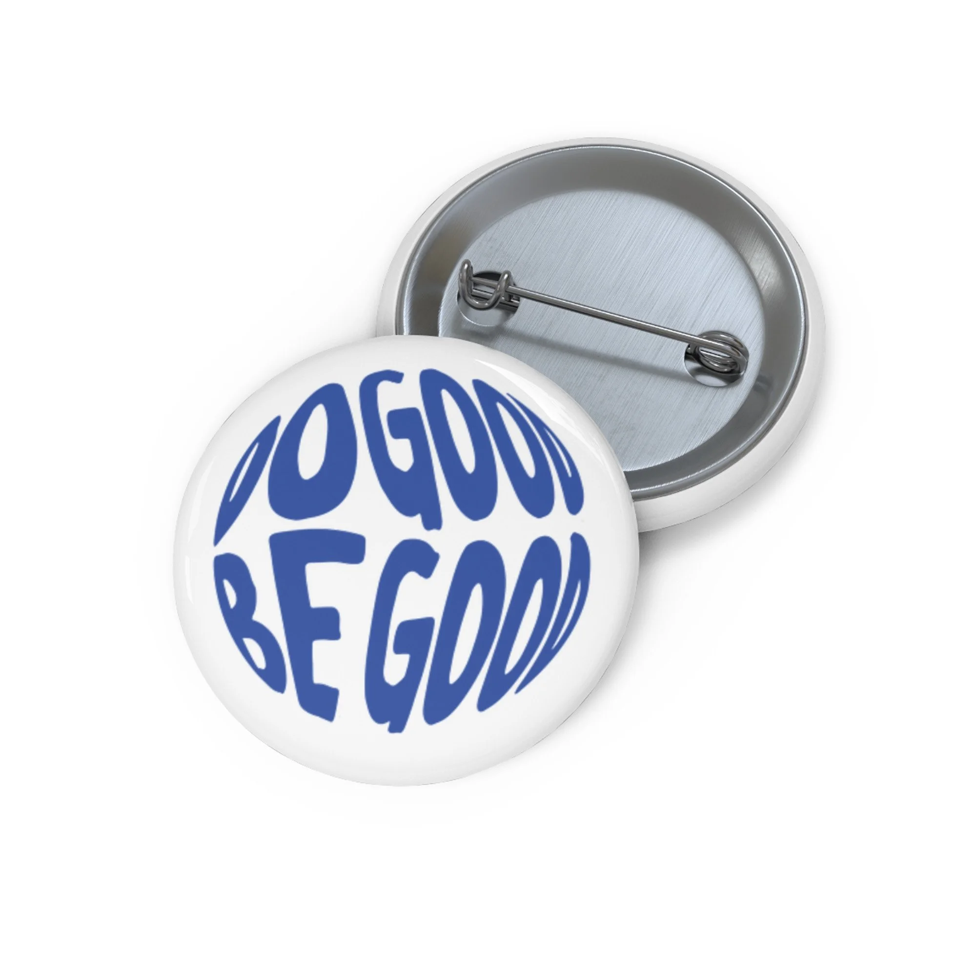 Round white pin button with the words 'Be Good' written in blue, showing the front view with the backside and pin mechanism visible.