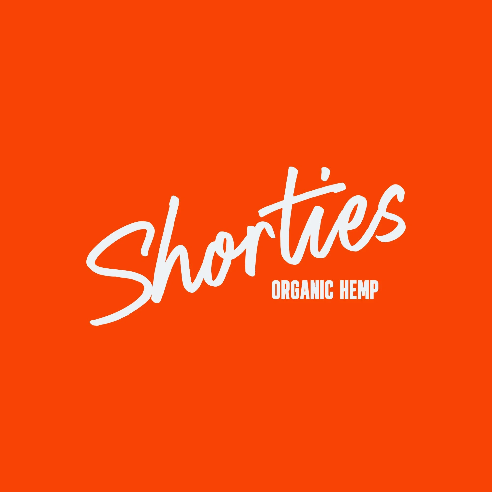Product label with the word 'Shorties' in large white script font and 'Organic Hemp' in smaller uppercase letters on an orange background.