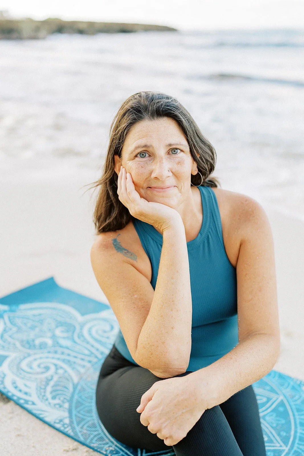 Stephanie Allen, founder of WildKind Travel, reflecting a calm and thoughtful approach to travel planning.