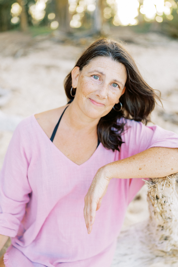Stephanie Allen, founder of WildKind Travel, pictured on the beach.