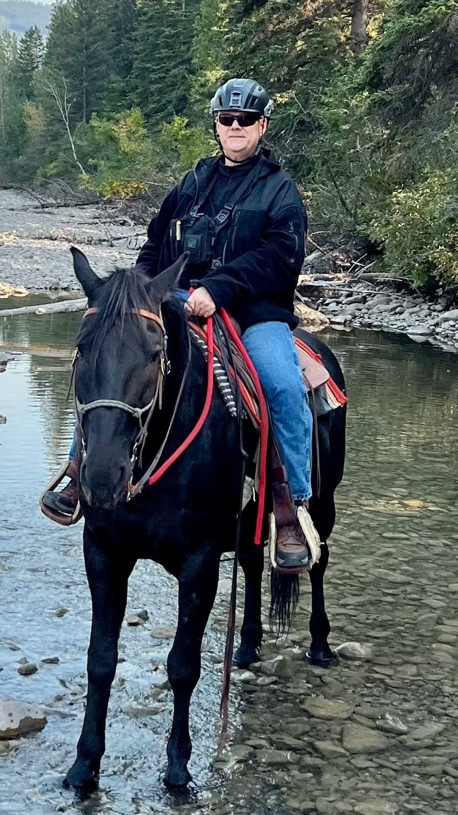 Sean Clarke on horseback during a trail ride in Kananaskis Alberta