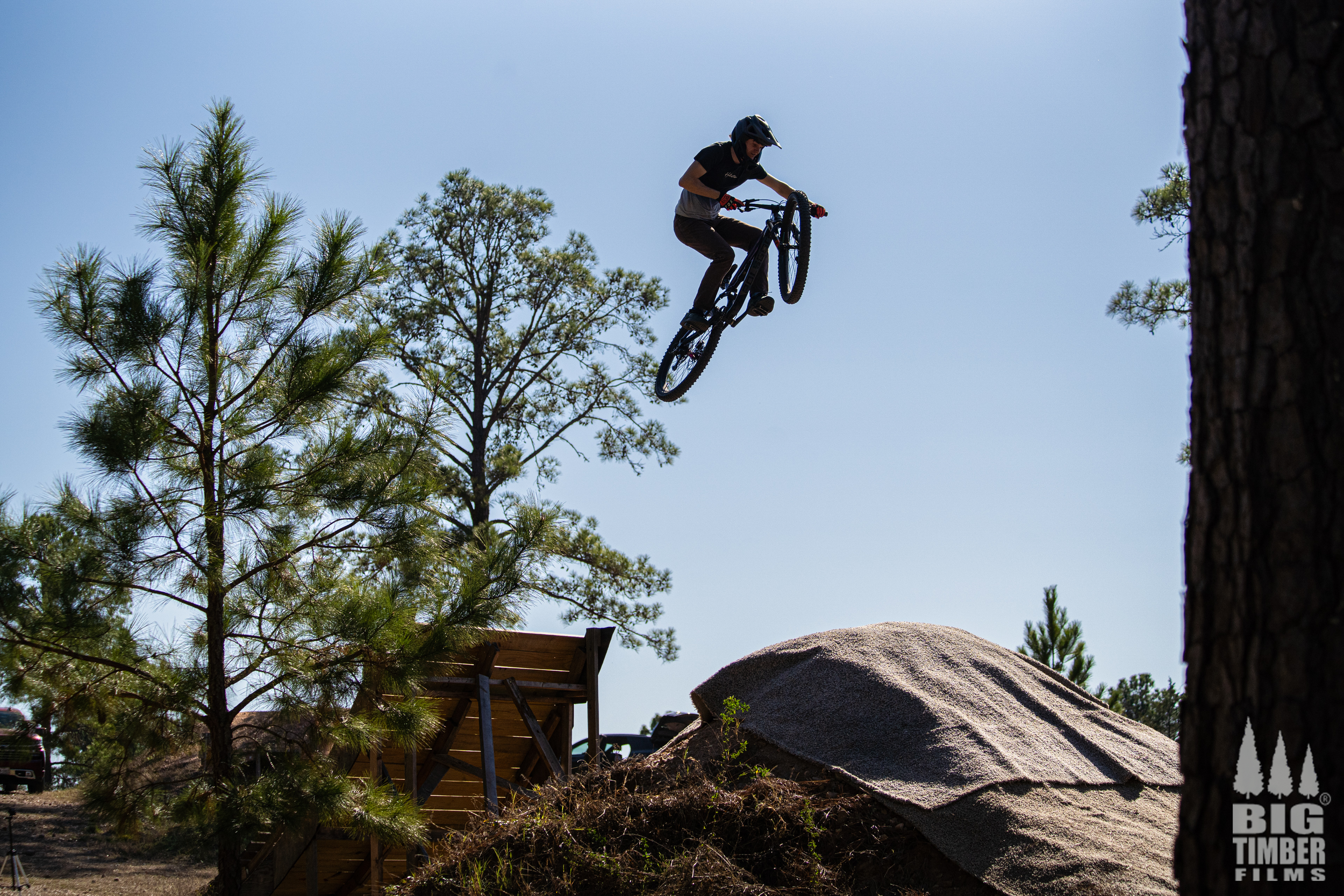 "Rider hitting the large kicker feature at the Freeride512 Bike Park."