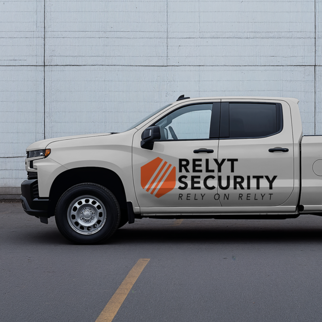 gray truck with Relyt Logo on the side.