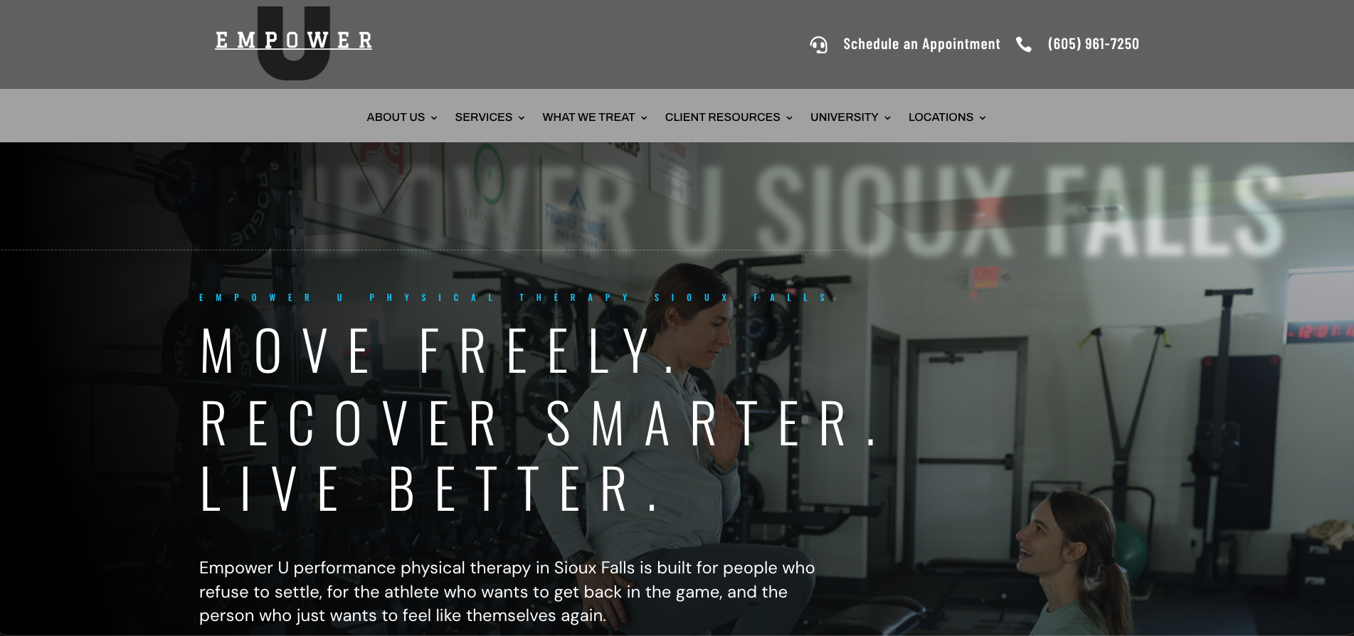 Website homepage for Empower U Physical Therapy Sioux Falls, with a background image of a woman and a girl in a gym, and large text overlay that says 'Move Freely. Recover Smarter. Live Better.'