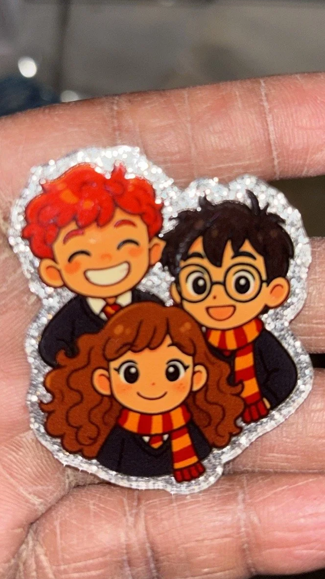 Harry Potter, Ron Weasley, and Hermoine Granger