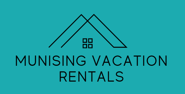 Logo for Munising Vacation Rentals featuring stylized mountain and house outline