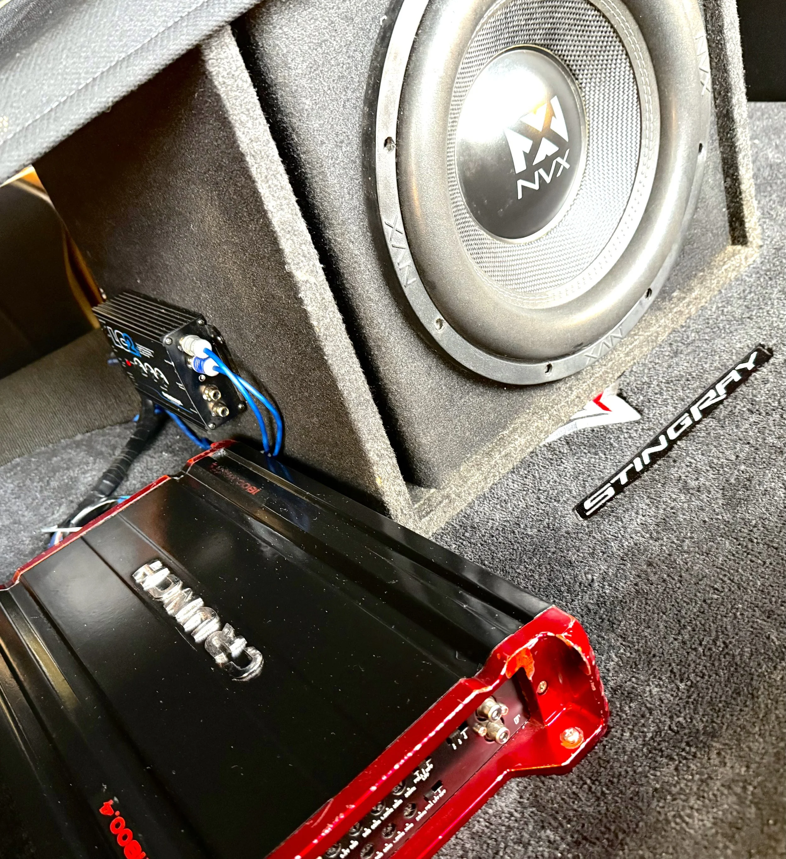  2014 C7 Stingray Sub and amp install with factory Bose system integration by Barset Mobile Car Audio Elk Grove