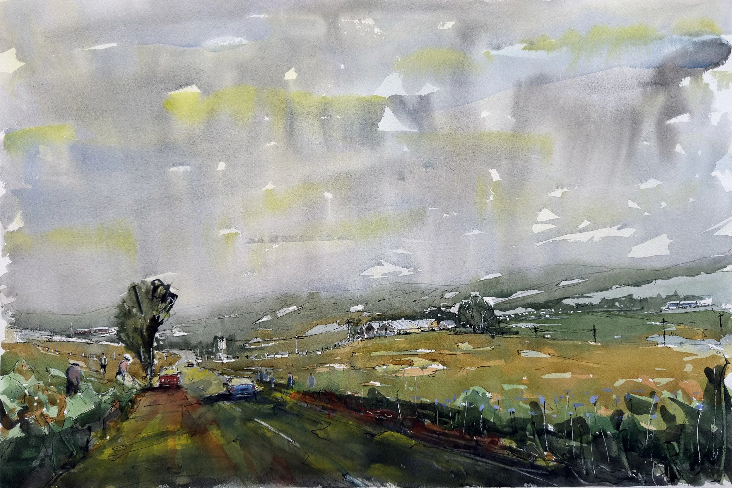 A watercolor painting of a rural landscape with a cloudy sky, fields, and a few cars on a road surrounded by trees and hills in the background.