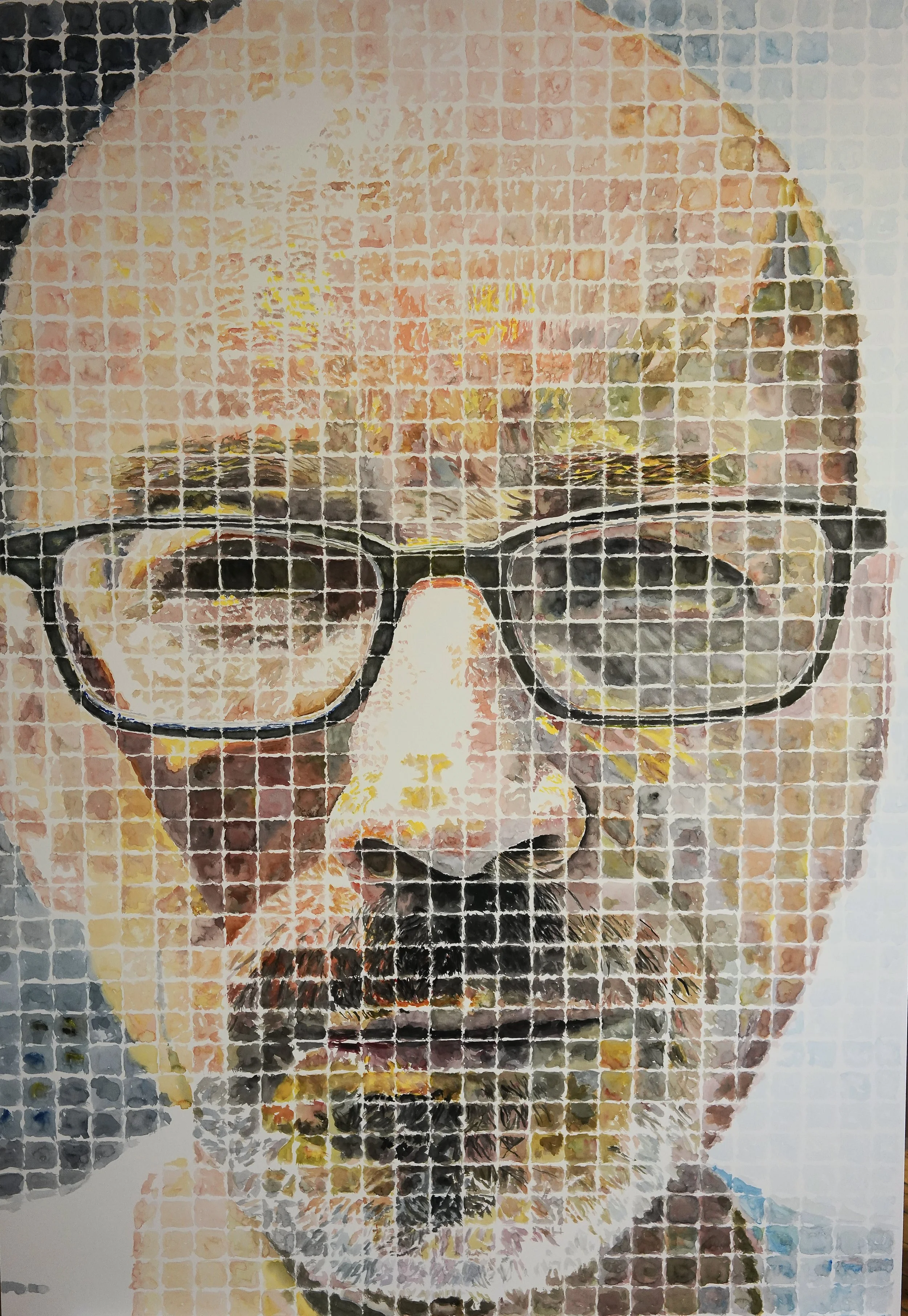 Pixelated mosaic-style portrait of a man with glasses and a beard.