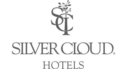 Silver Cloud Hotels logo featuring a tree and stylized initials 'SC' in black and gray.