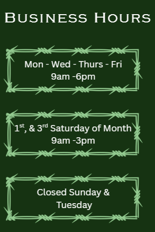 Sign displaying business hours with green background and barbed wire border, indicating hours from Monday to Friday 9am to 6pm, 1st and 3rd Saturday of the month 9am to 3pm, closed Sundays and Tuesdays.