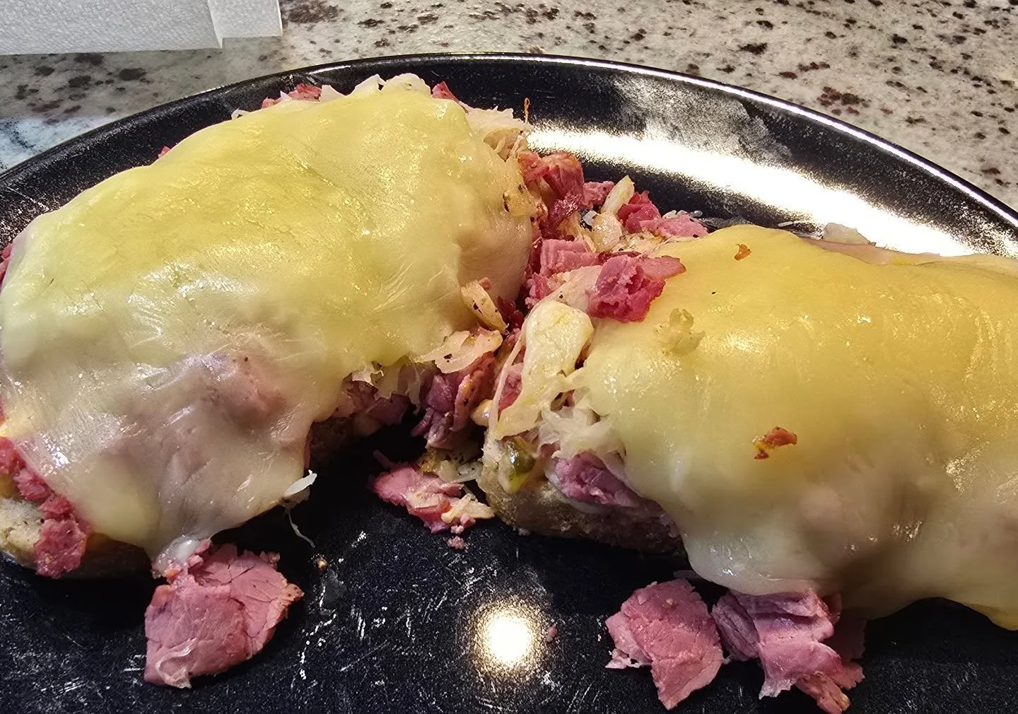 Happy Saint Patrick's Day to ya! Open face corn beef sandwiches with saurkraut and homemade Thousand Island dressing. Not pictured coleslaw.  One of us had 1 piece the other 2.75. To be sure this will fill you up and give you warming food coma. Messa