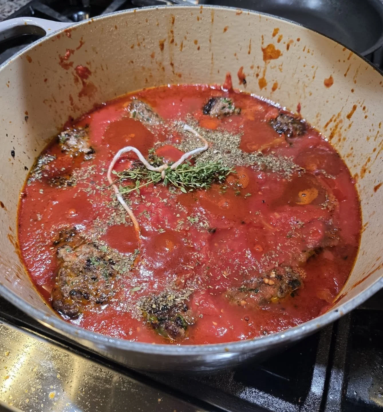 Homemade meatballs and Russo's Sunday sauce with spaghetti. It's what's for dinner.