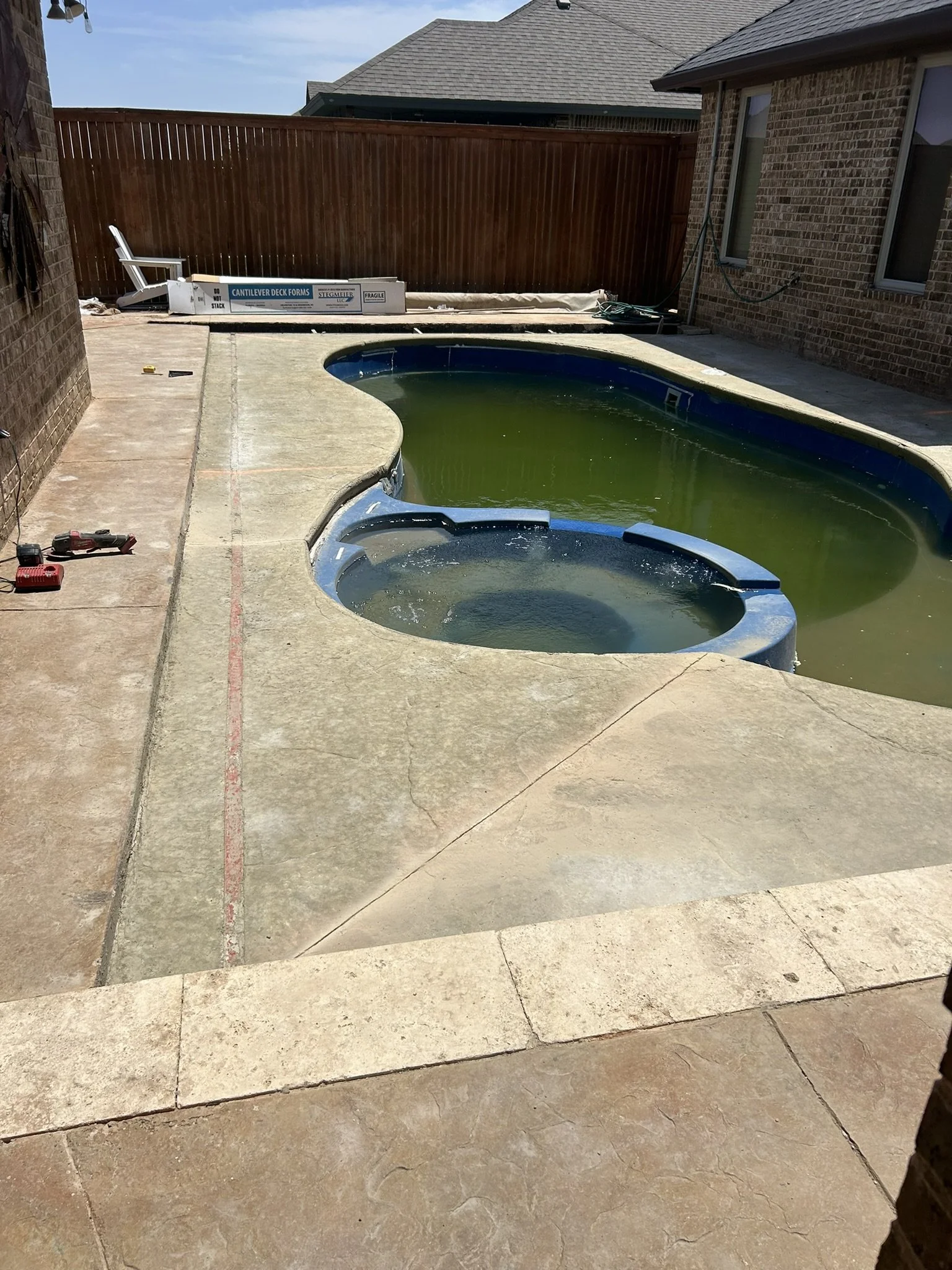 High-quality concrete pool deck construction in Lubbock, TX.