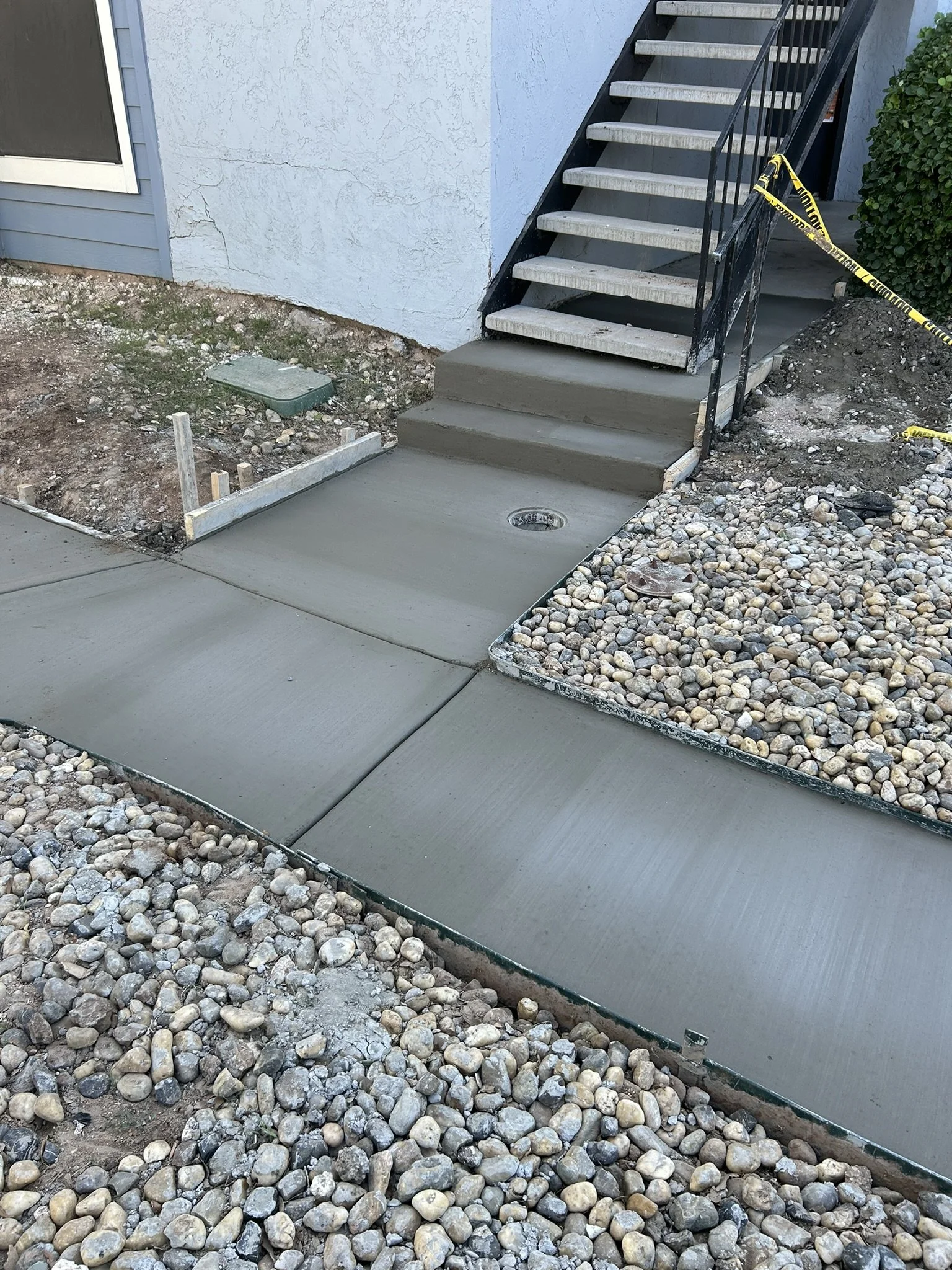 Freshly finished concrete pathway designed for clean property access.