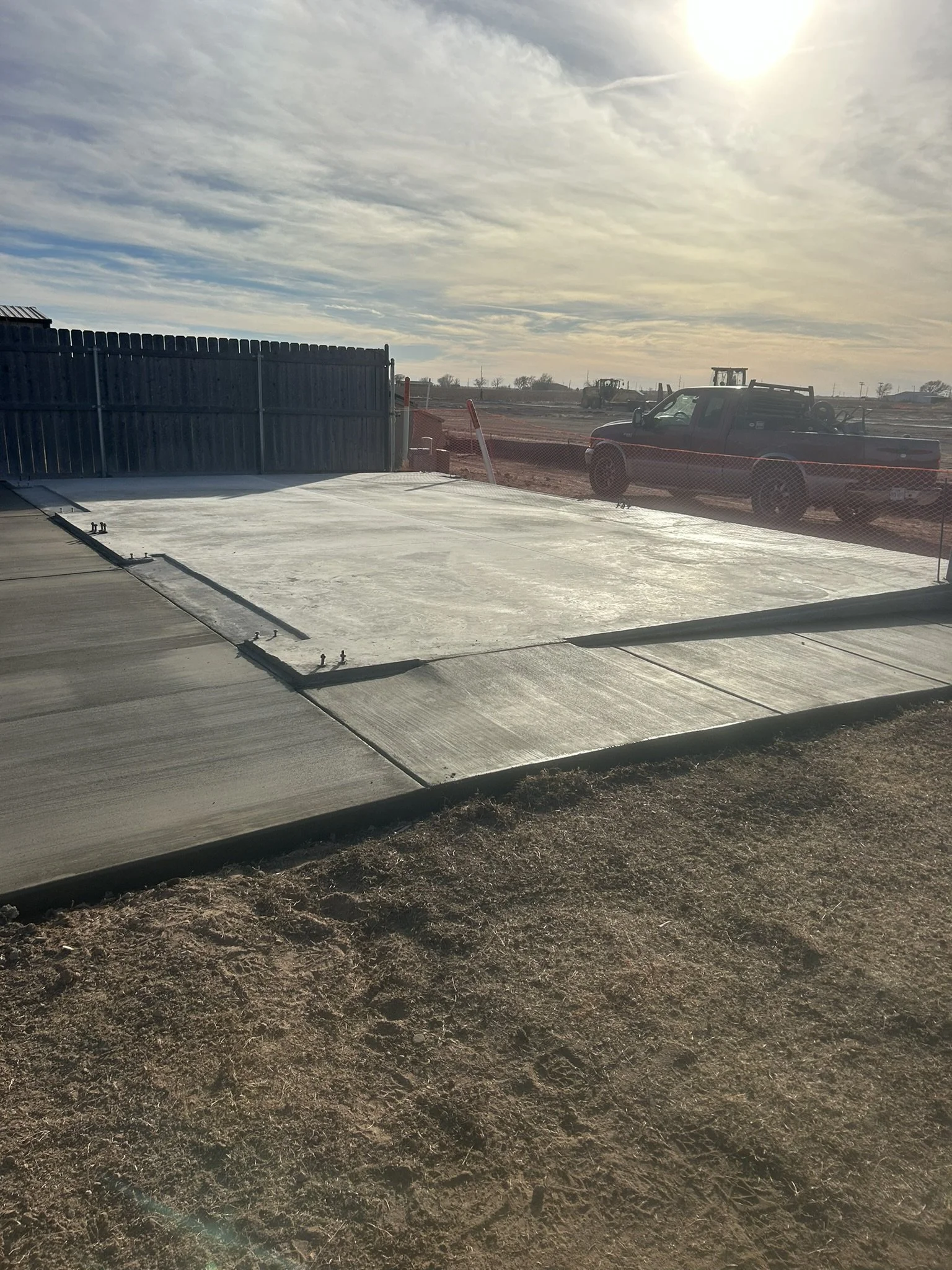 Durable freshly finished concrete slab for metal building in West Texas