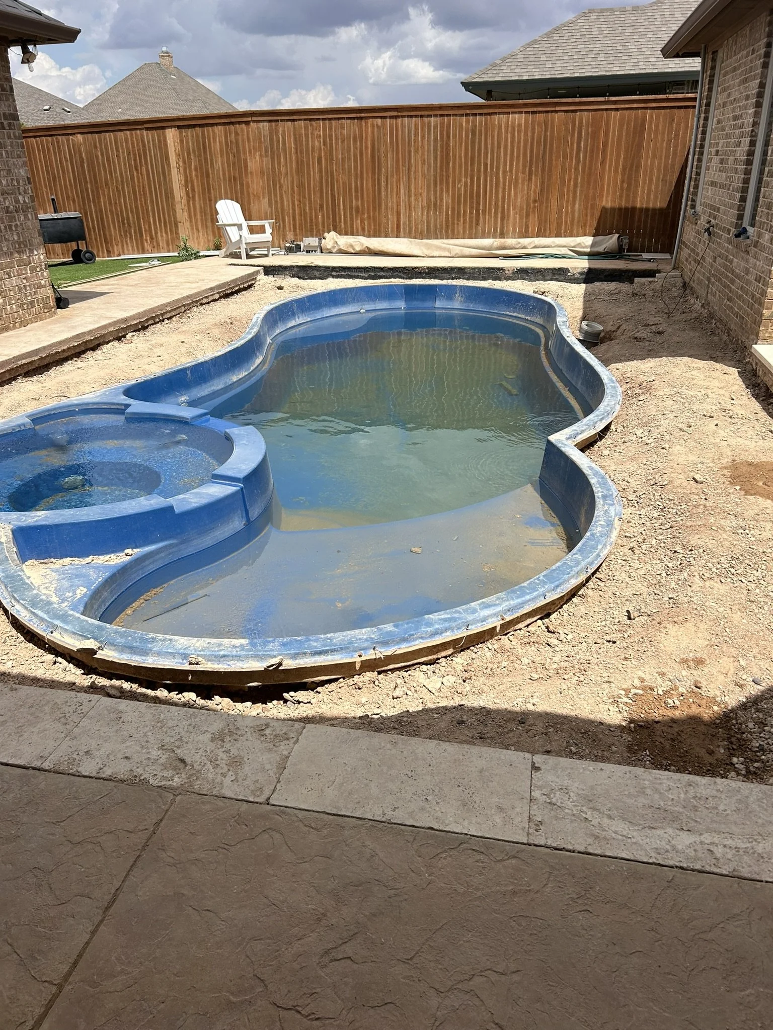 Forming and framing out a custom concrete pool surround layout.