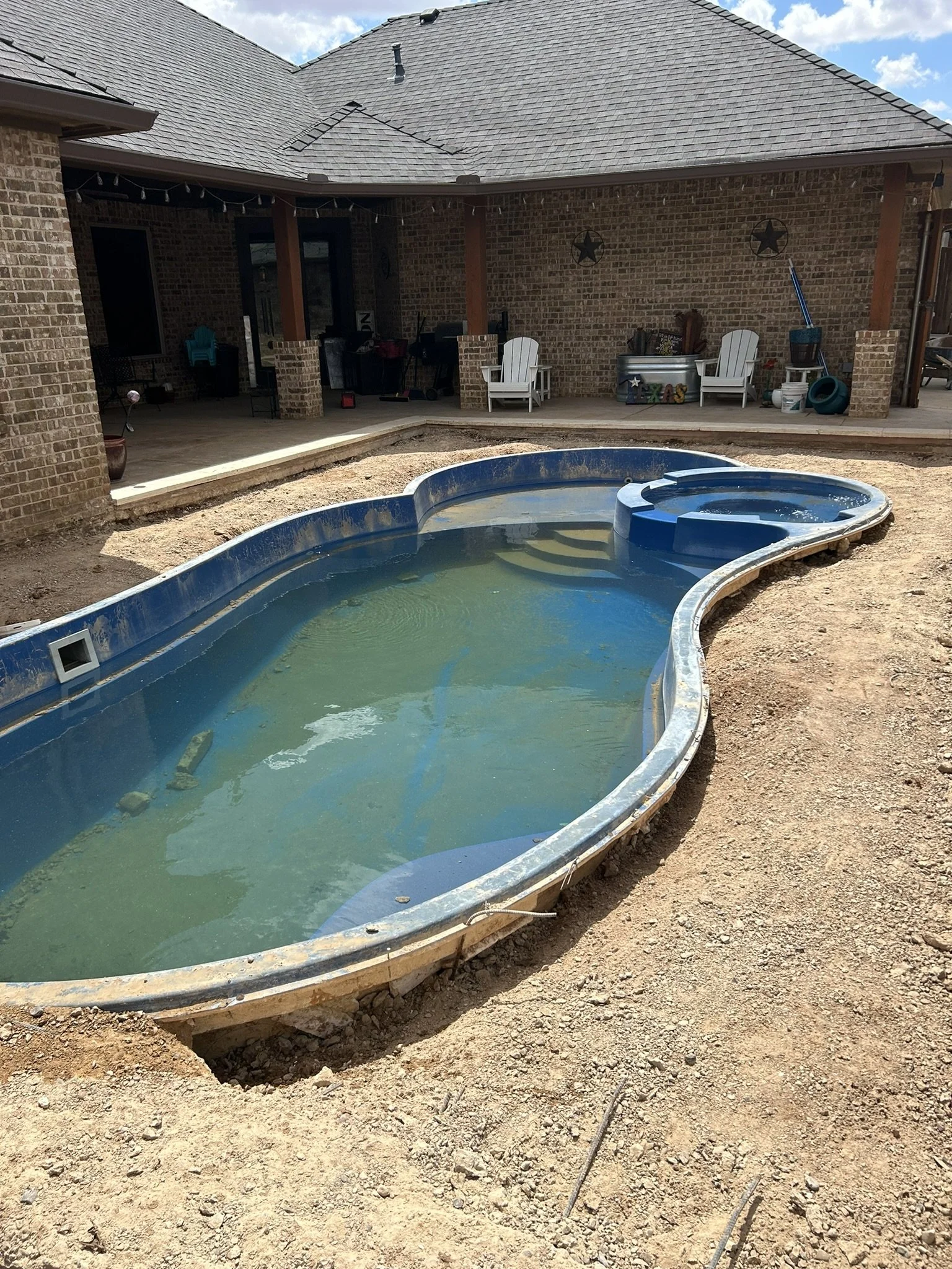 Prepped and leveled base for a custom concrete pool deck surround.