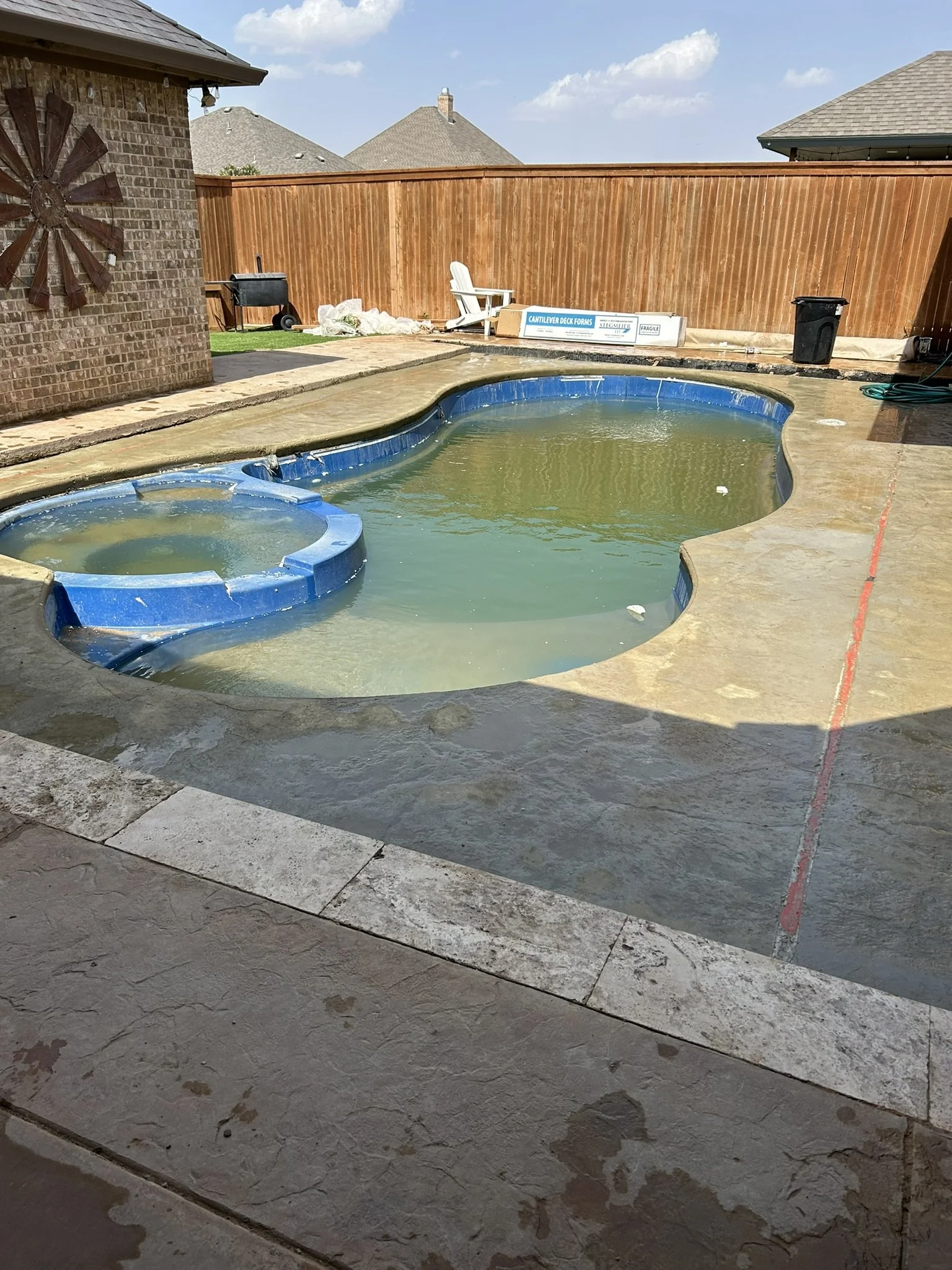 Custom concrete flatwork for outdoor entertainment and pool areas.