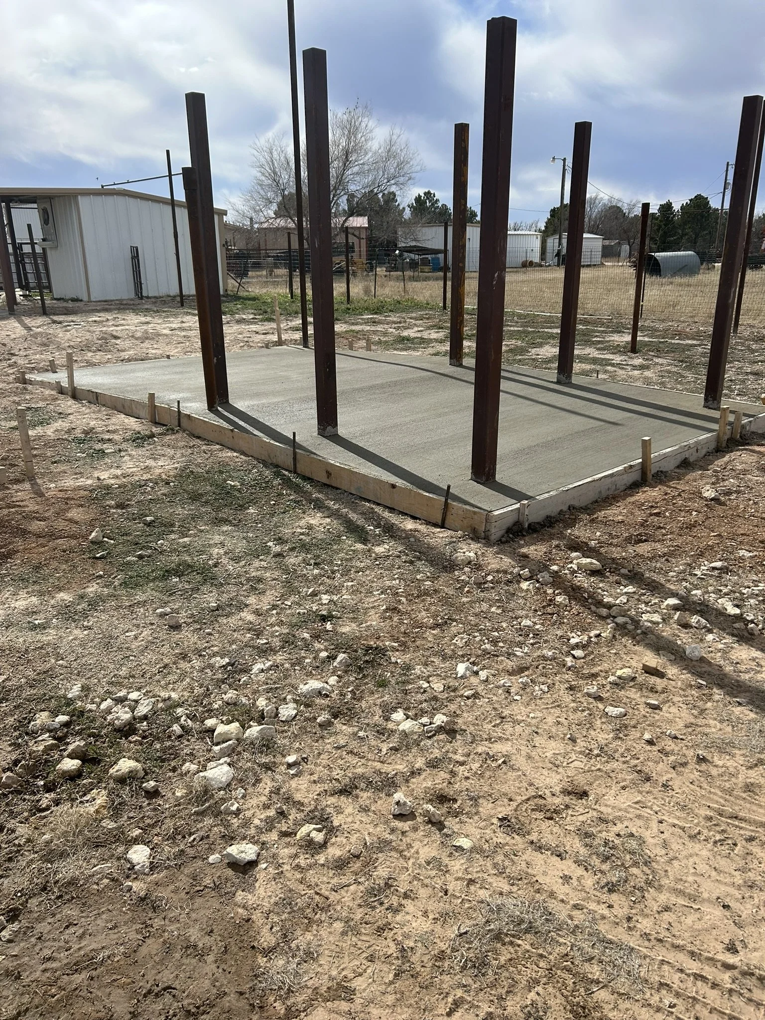 Strong, reinforced concrete slab installation for long-lasting durability.