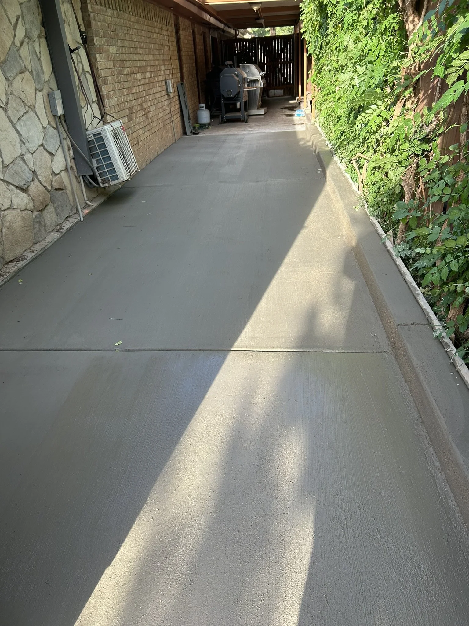 Completed high-quality concrete installation and backyard improvement project in Lubbock.