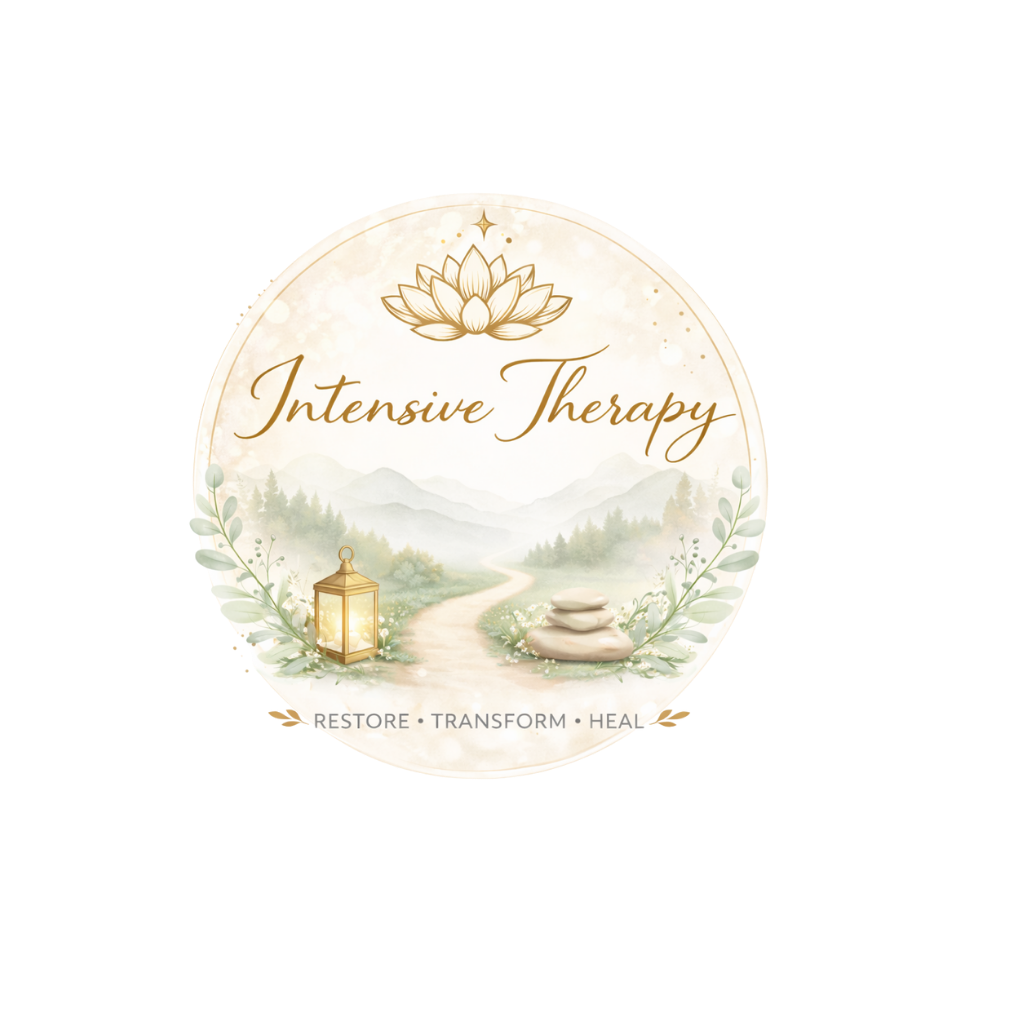 Two people sitting at a white table, each holding a mug of coffee. One person is wearing a black hoodie and the other a beige sweater. Natural light coming from a window.