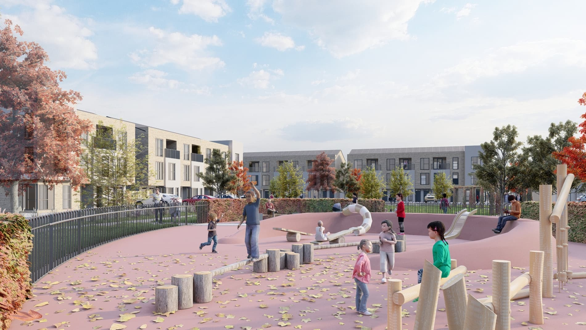 A modern outdoor playground in a residential area during autumn, with children and adults engaging in various activities. The playground has a pink ground, scattered yellow leaves, wooden climbing structures, and a slide. There are trees with fall foliage and multi-story residential buildings in the background under a partly cloudy sky.