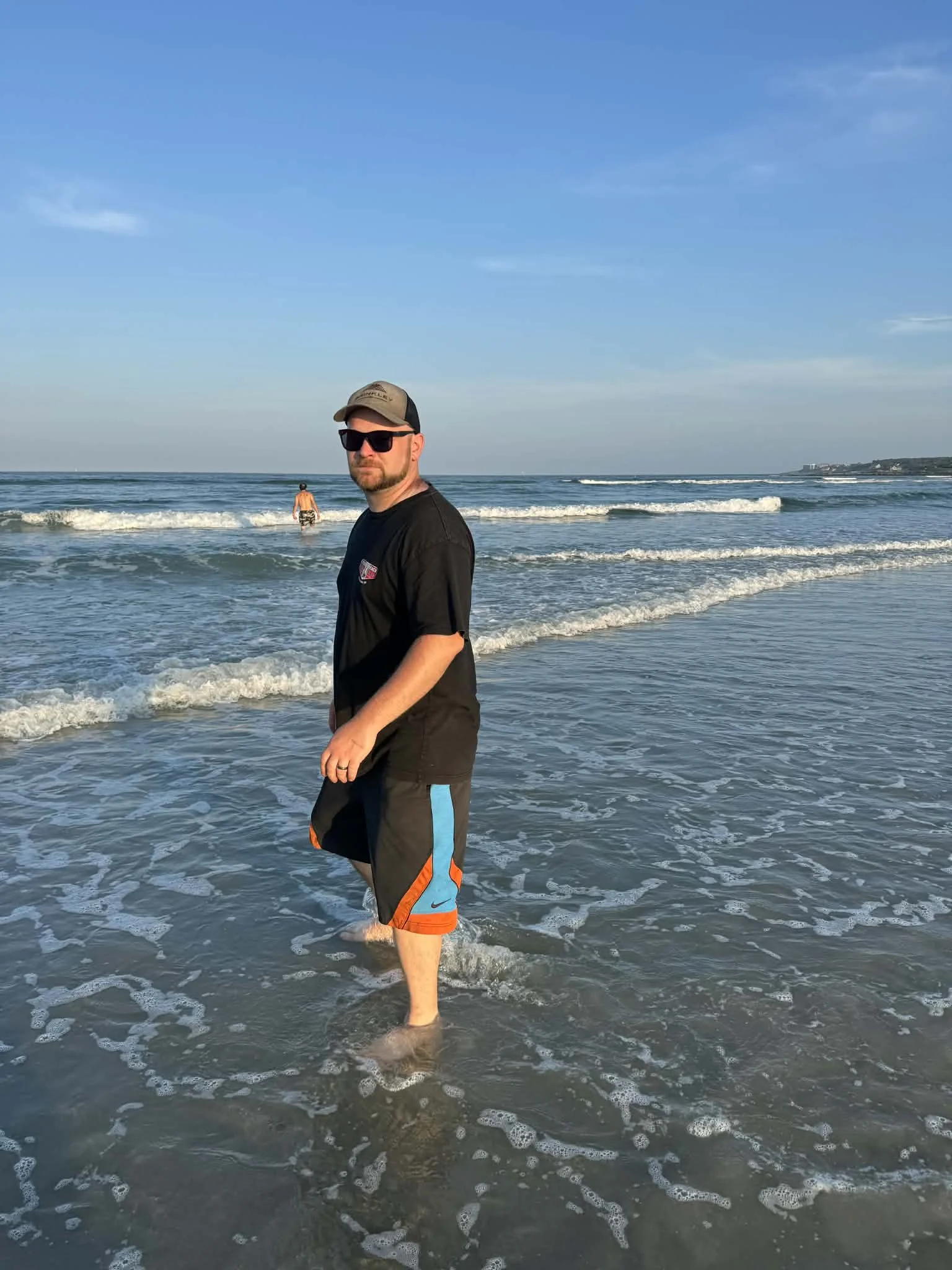 A man standing on the beach