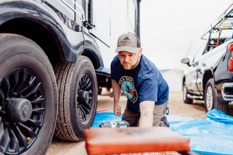 Acadia Mobile Rb Service Working on a camper