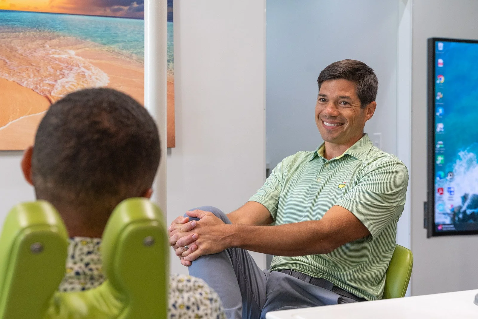 Dr. Weiler talking with a patient during a braces and Invisalign consultation in Harrisonburg, VA