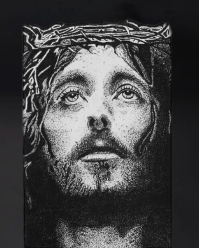 A black and white drawing of Jesus Christ with a crown of thorns on his head, looking slightly upward.