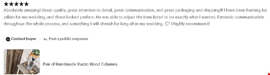 A pair of handmade rustic wood columns with a small potted plant and glass jar placed on top.