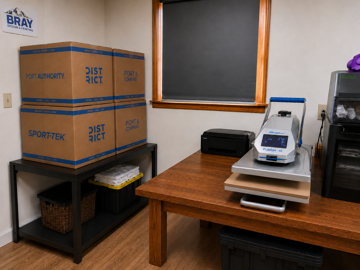 Generic image of workspace with apparel in boxes stacked
