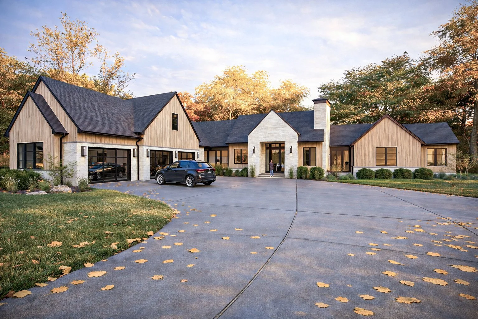 Luxury estate front exterior featuring natural vertical wood siding, light stacked stone accents, and sharp black gables.