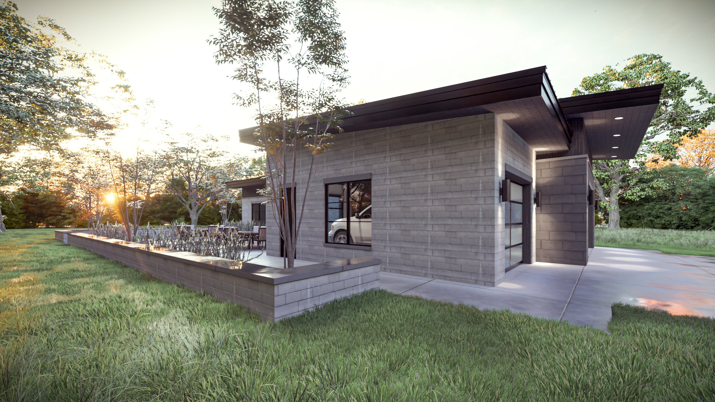 Custom modern home with garage designed to complement the flat roof architecture and clean exterior lines.