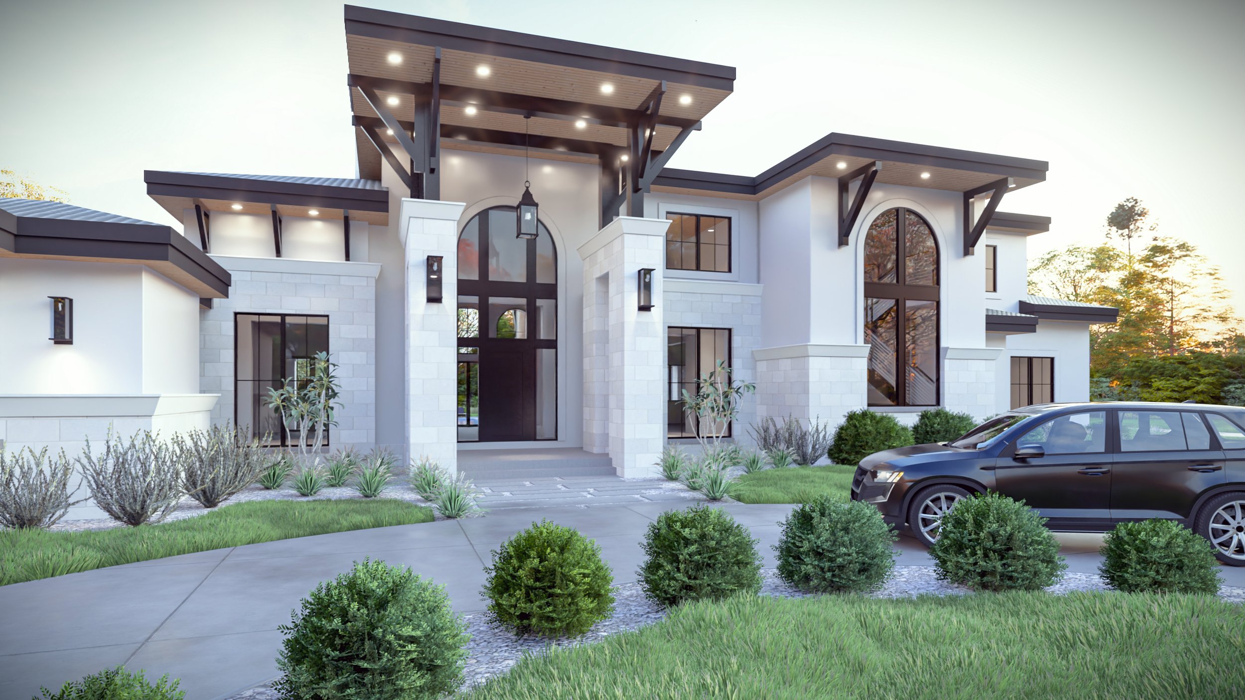 Front exterior of a custom Mediterranean-style home featuring stucco walls, slate roof, arched entryway, and landscaped driveway.