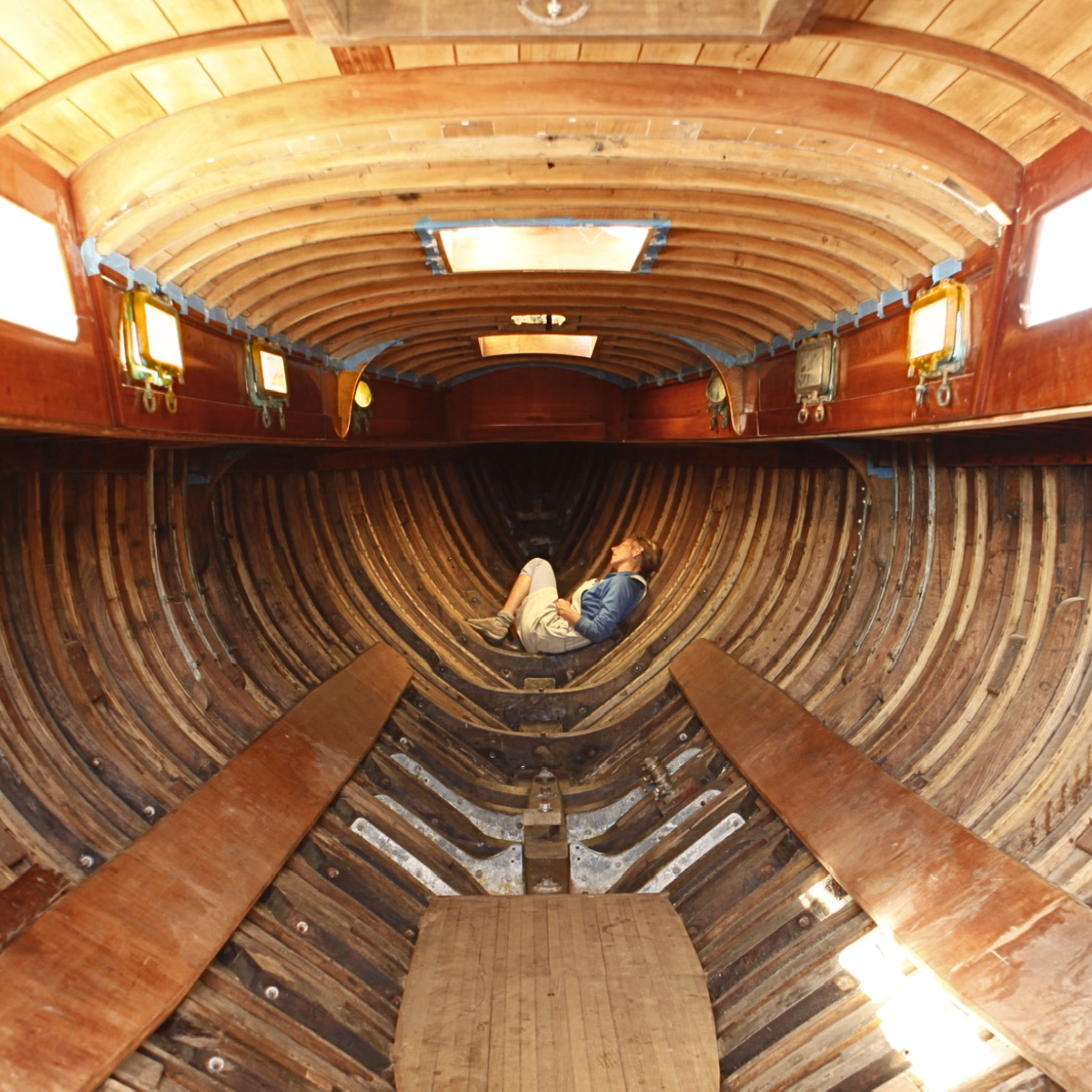 Captain e2 Brewster in the belly of TRE, during refurbishment.