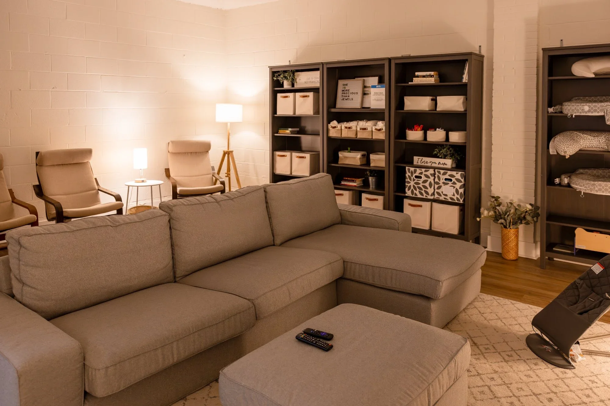 couches, chairs and supplies in mom's room