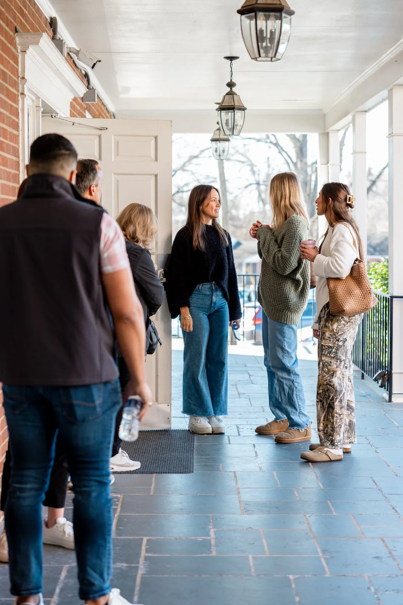 church attendees chatting in front of the church entrance