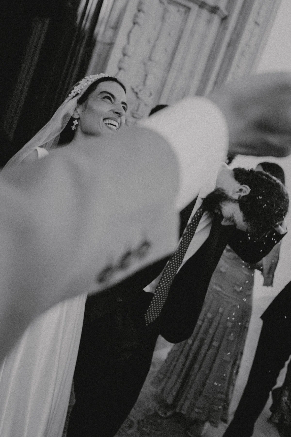 Documentary moment of bride and groom photographed by lookimaginary in a Portugal destination wedding in Algarve