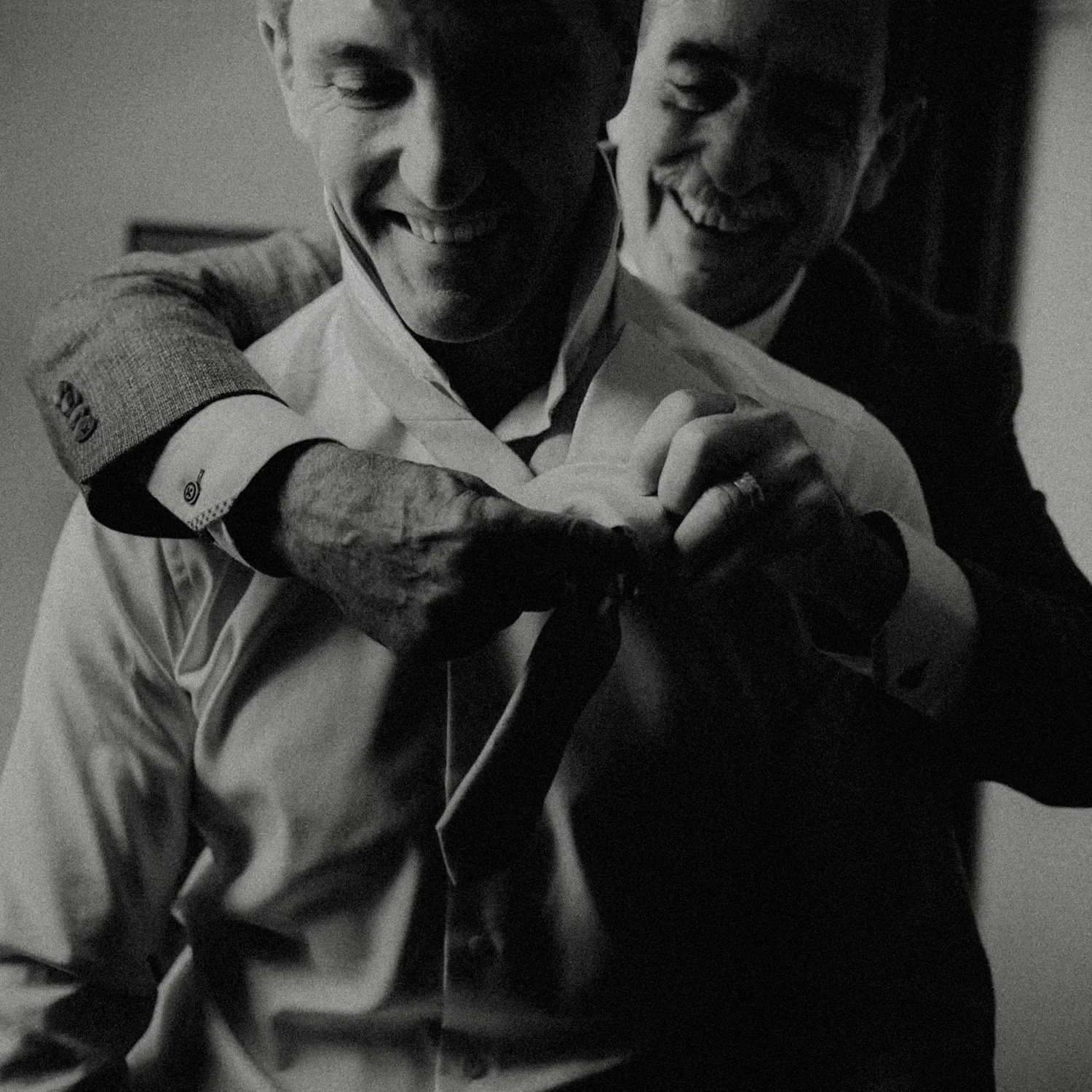 Documentary wedding moment during groom getting ready