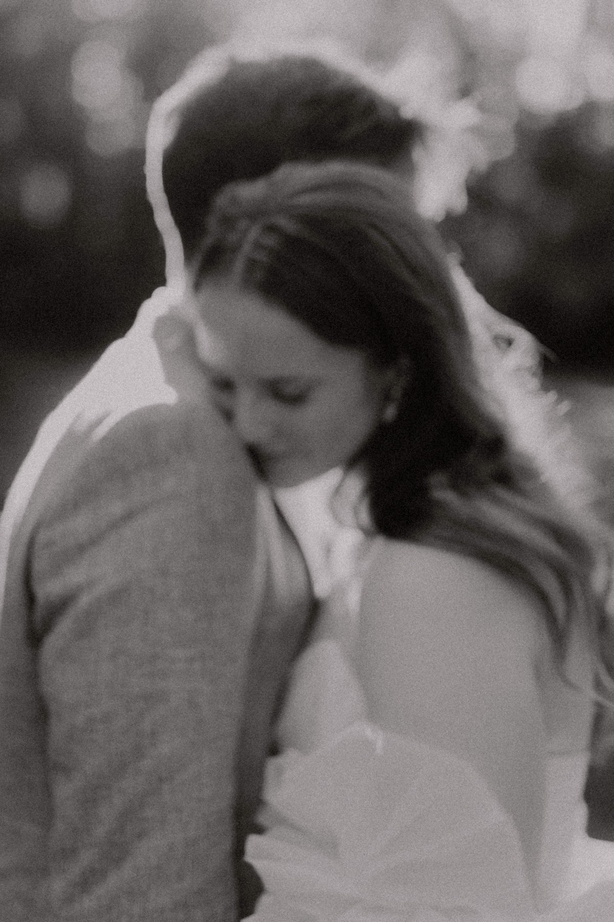 Intimate moment between bride and groom in Europe