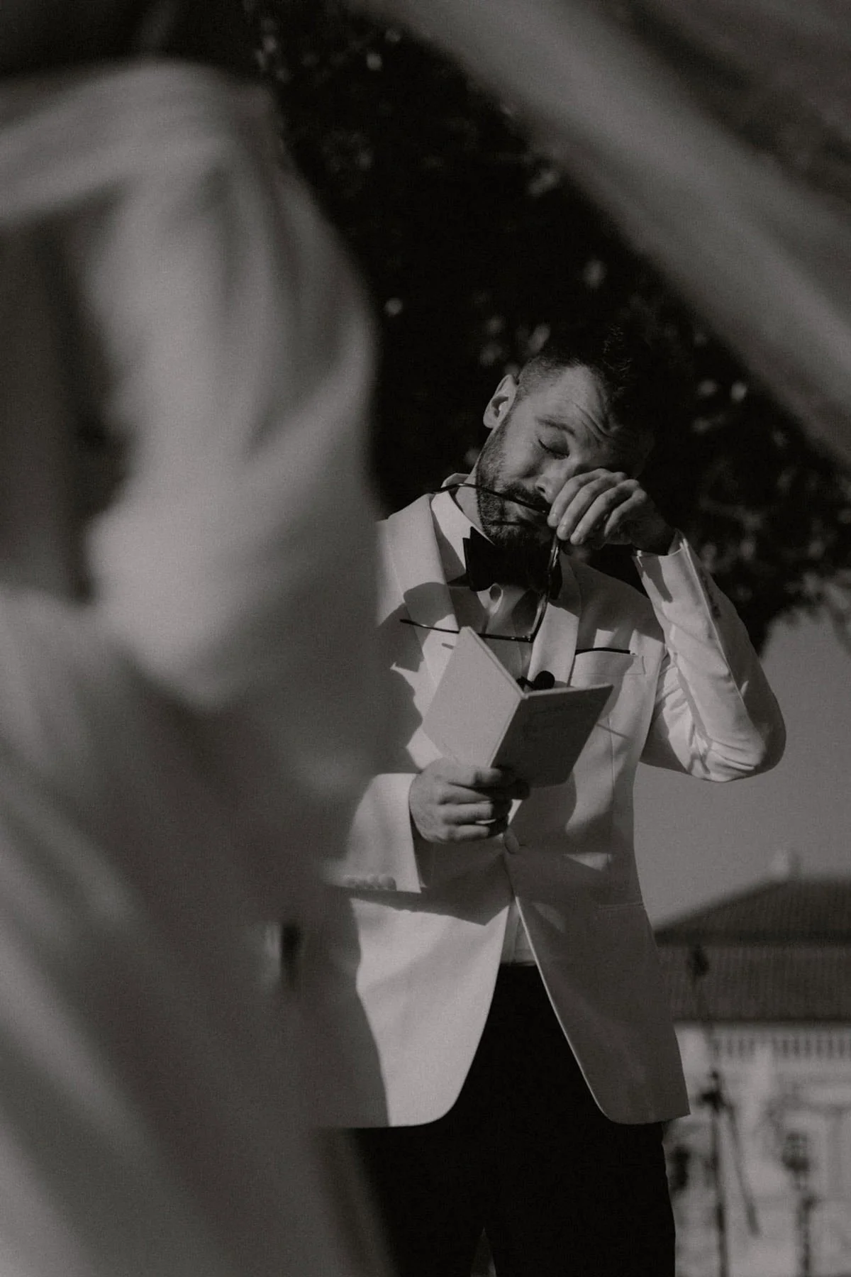 Groom tearing up during an intimate moment on his wedding day in Portuga