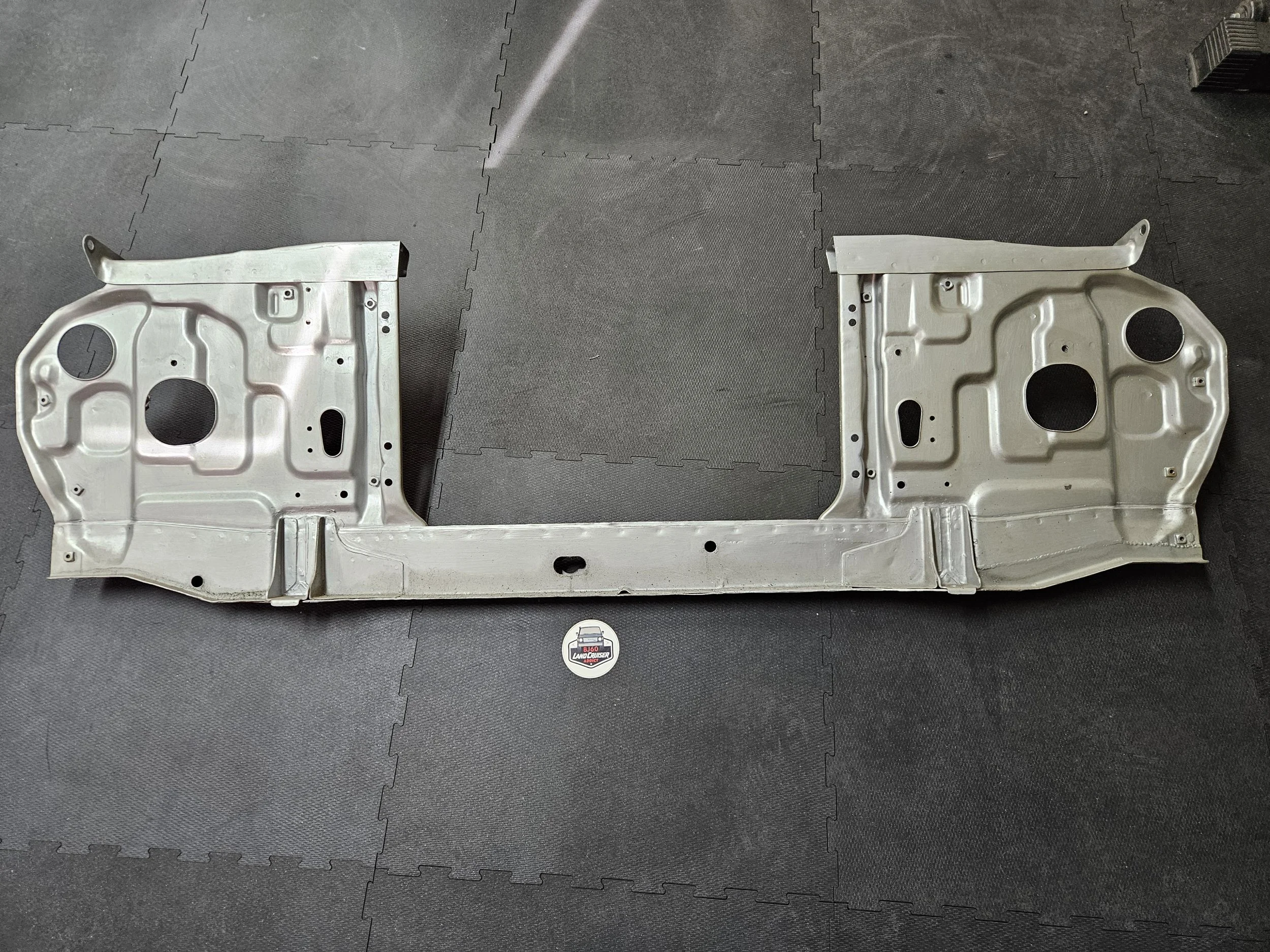 60-series Toyota Landcruiser front core/radiator support, back view.