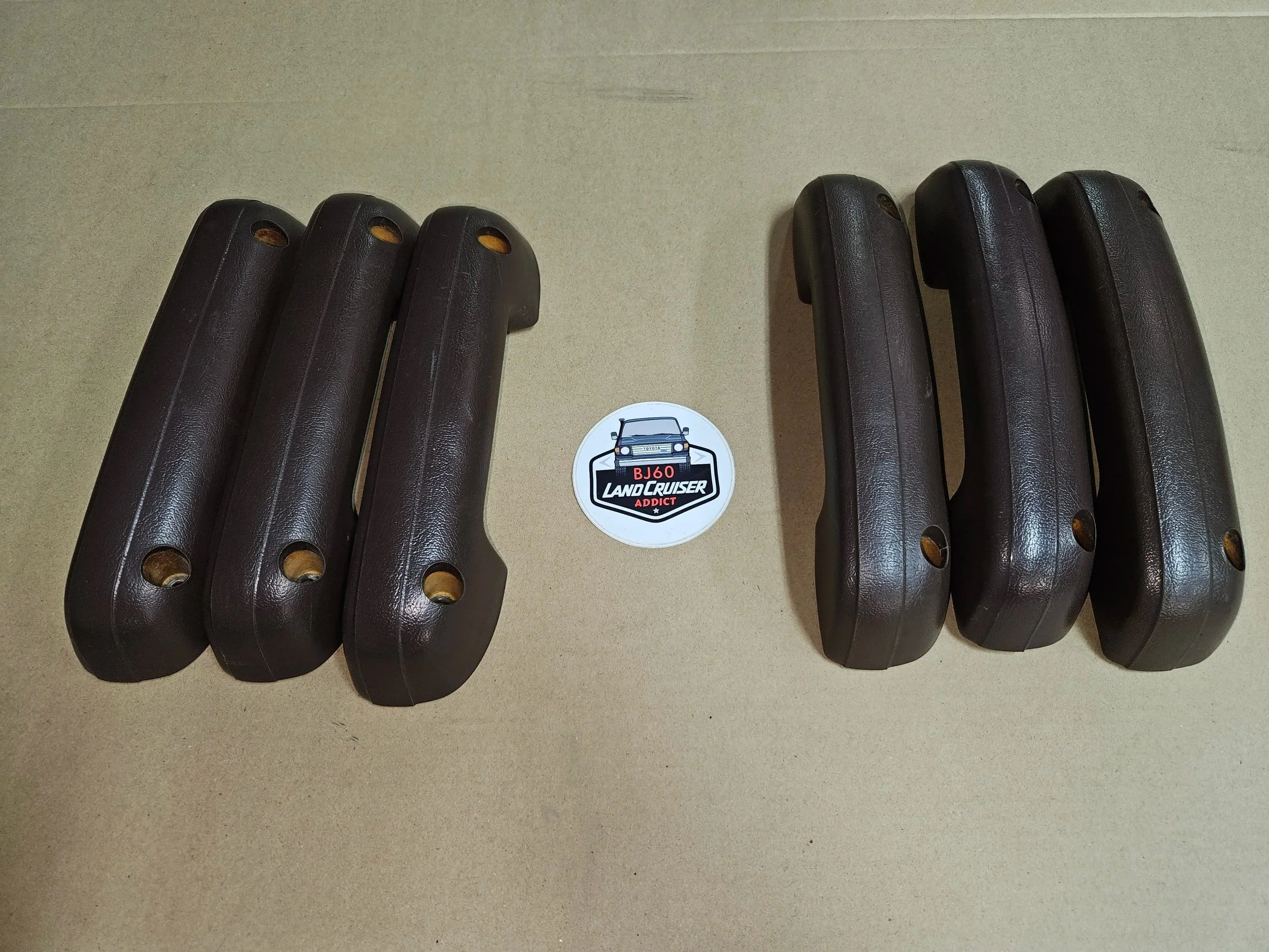 60-series Toyota Landcruiser brown armrests.