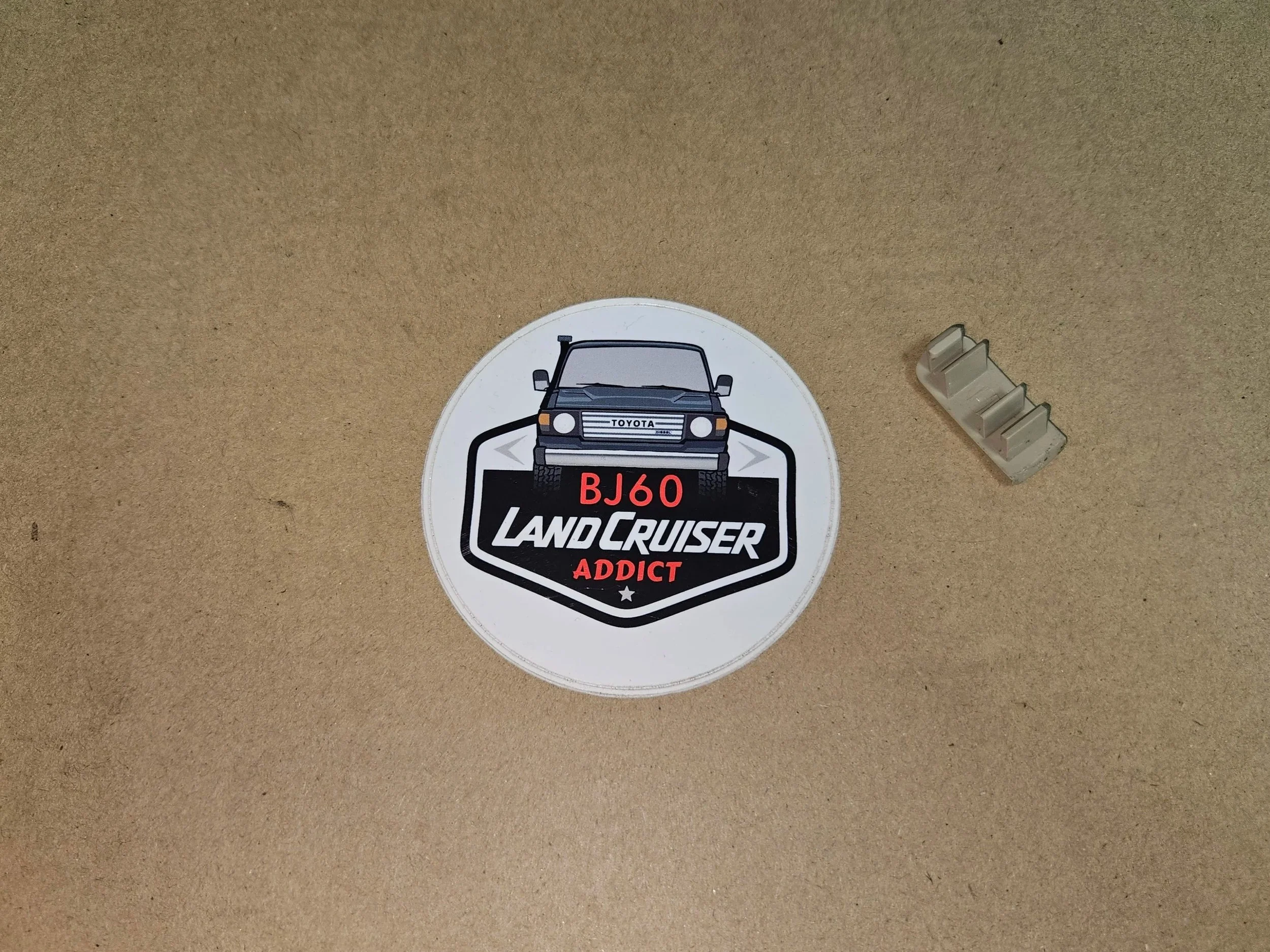 60-series Toyota Landcruiser Back door assist grip plug (ivory).