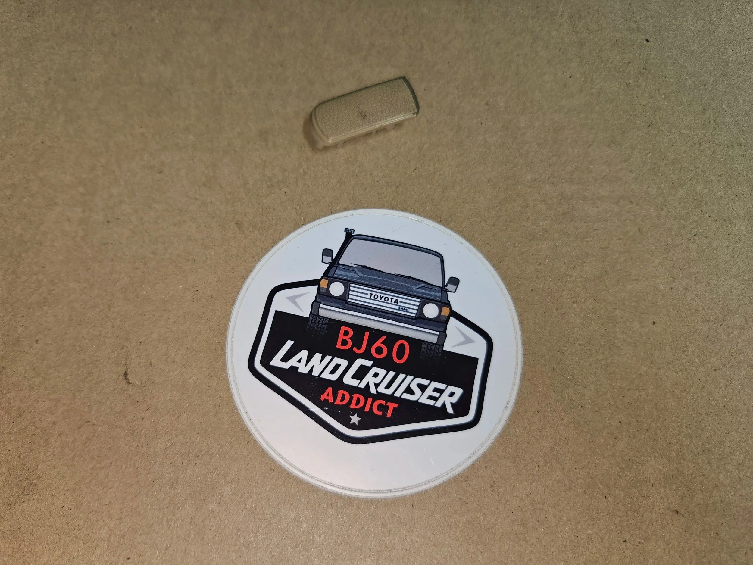 60-series Toyota Landcruiser Back door assist grip plug (ivory).