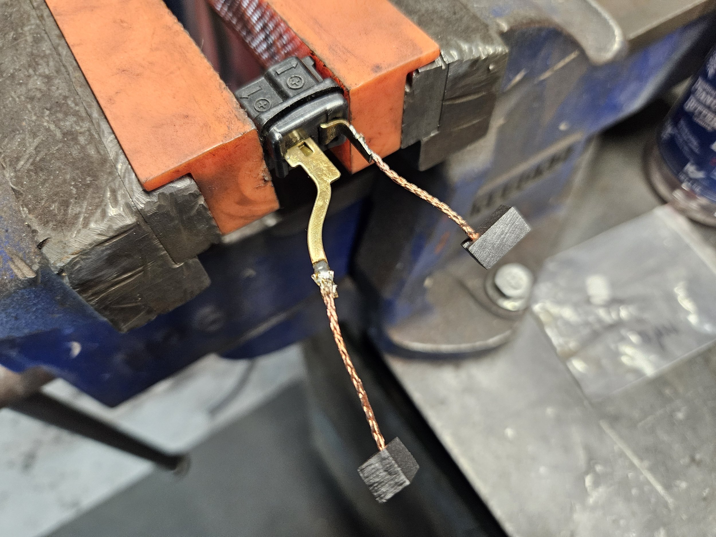 New brushes soldered onto blower motor plug.