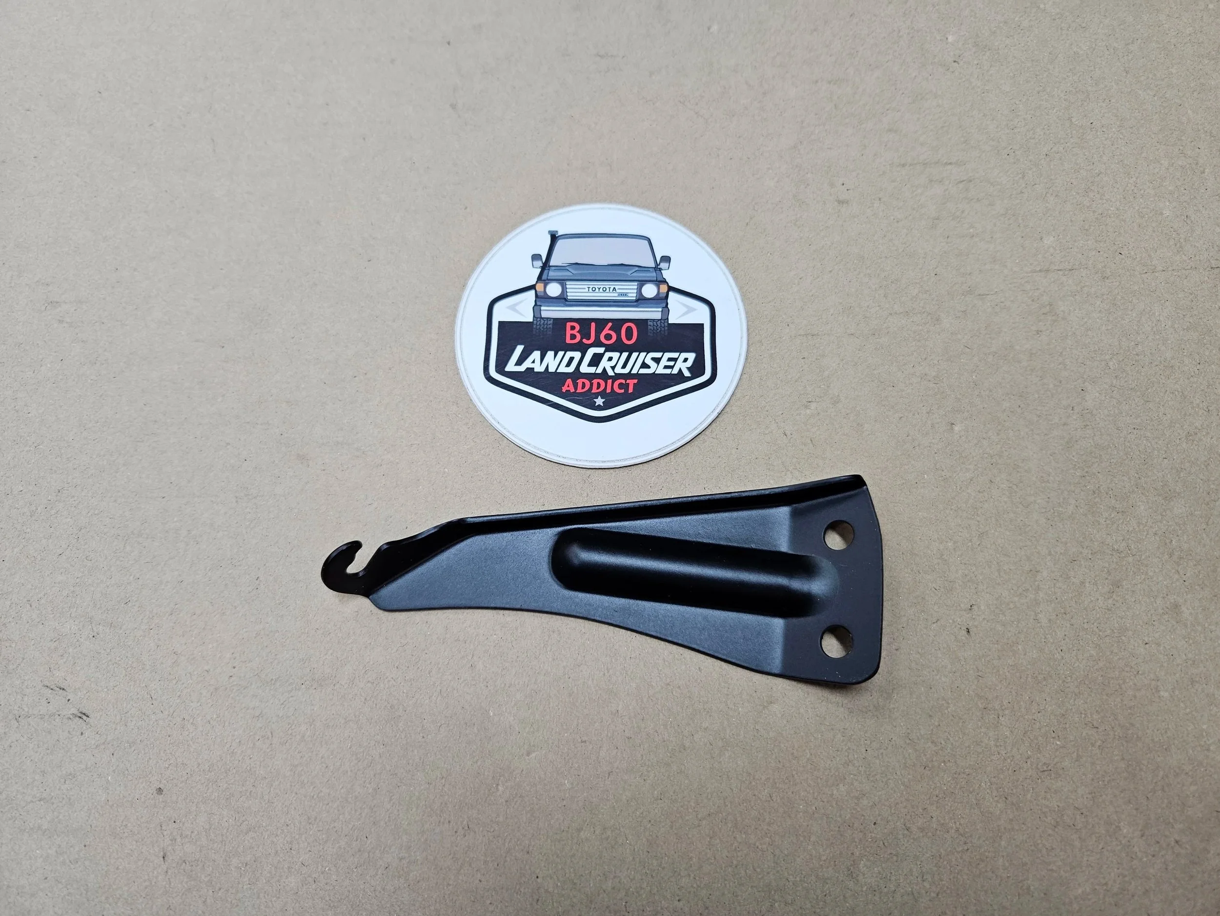 60-series Toyota Landcruiser throttle cable bracket.
